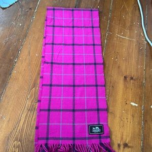 Selling a plaid pink coach scarf